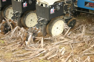 Kinze Coulters Throwing Soil